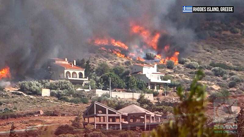 Wildfires on Greece’s Rhodes Island force thousands to evacuate