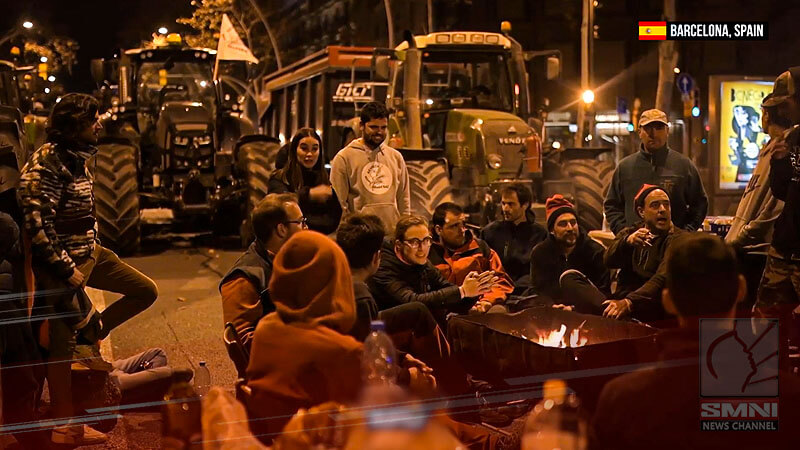 Farmers camp out in tractor cabs in Barcelona as EU-wide protests continue