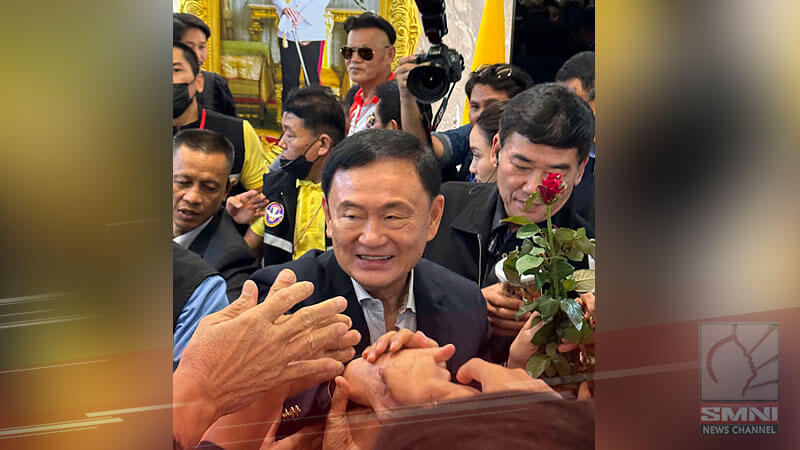 Thailand’s ex-PM visits Pheu Thai party’s HQ for first time since exile