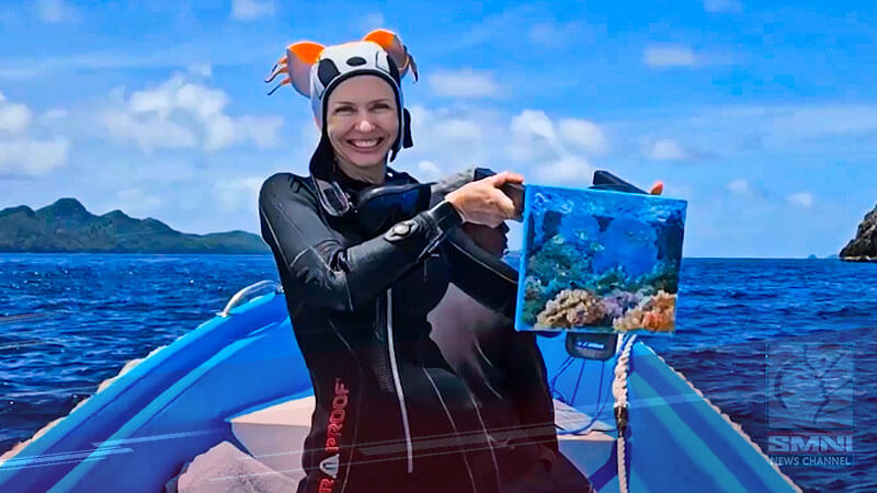 Russian artist dons scuba gear to create deep sea paintings